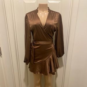 Shimmery brown ruffle wrap around midi dress with long sleeves.